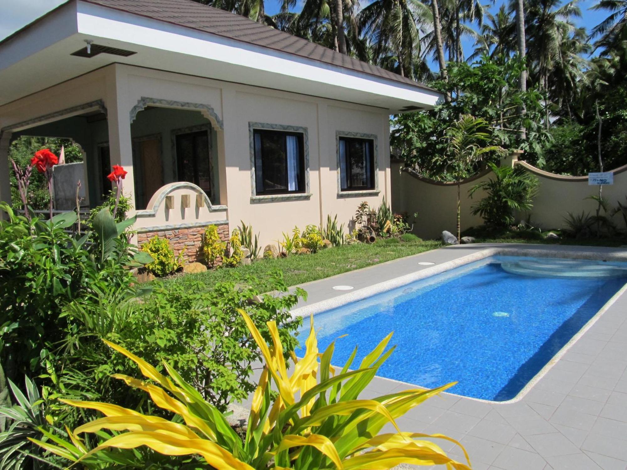 Ucoy Beach Resort Libertad Buitenkant foto